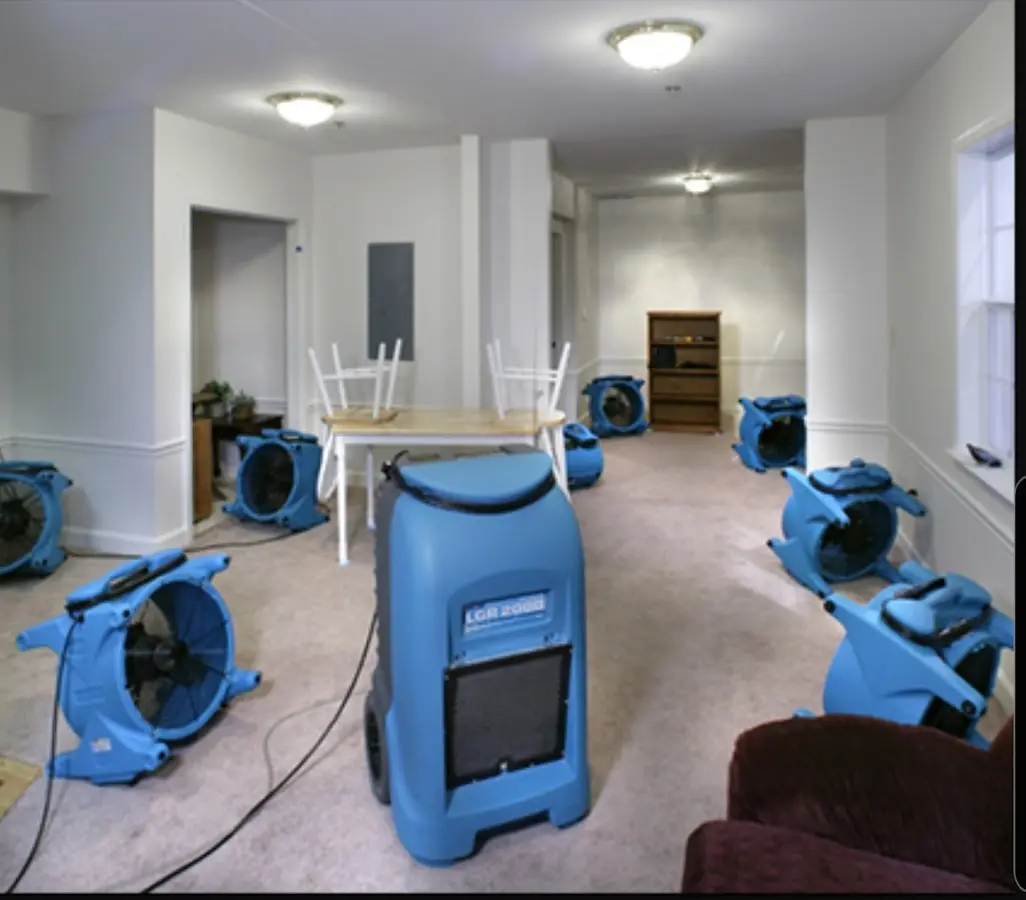 Air movers and dehumidifier setup for Water Damage Restoration in Wylie